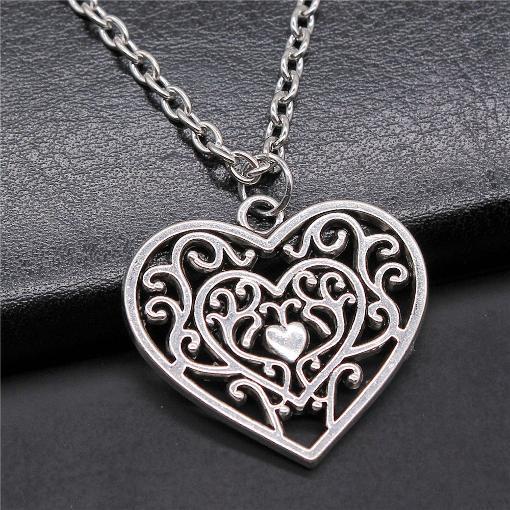 Carved Heart Shaped Heart Pendant Necklace