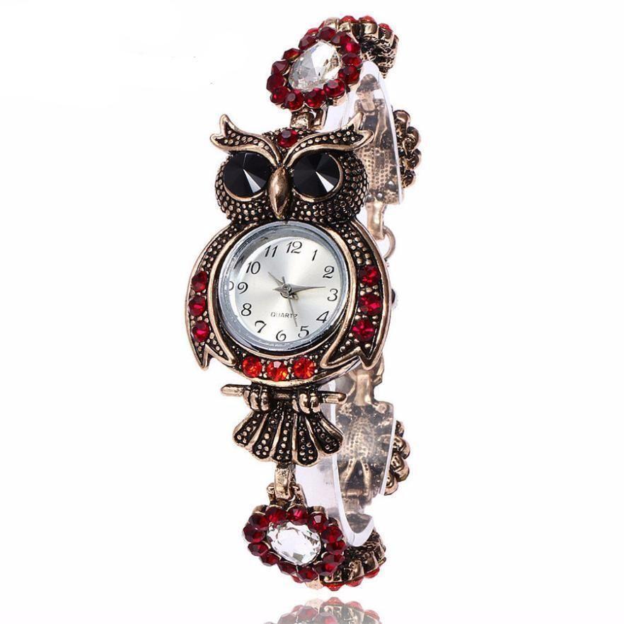 Montre-bracelet élégante en forme de hibou à quartz en acier inoxydable vintage pour femmes